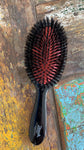 Hairbrush with natural bristles medium bag size